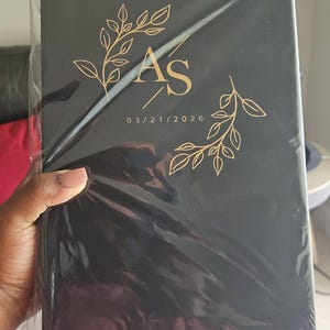 Cynthia added a photo of their purchase