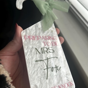 Sarah added a photo of their purchase