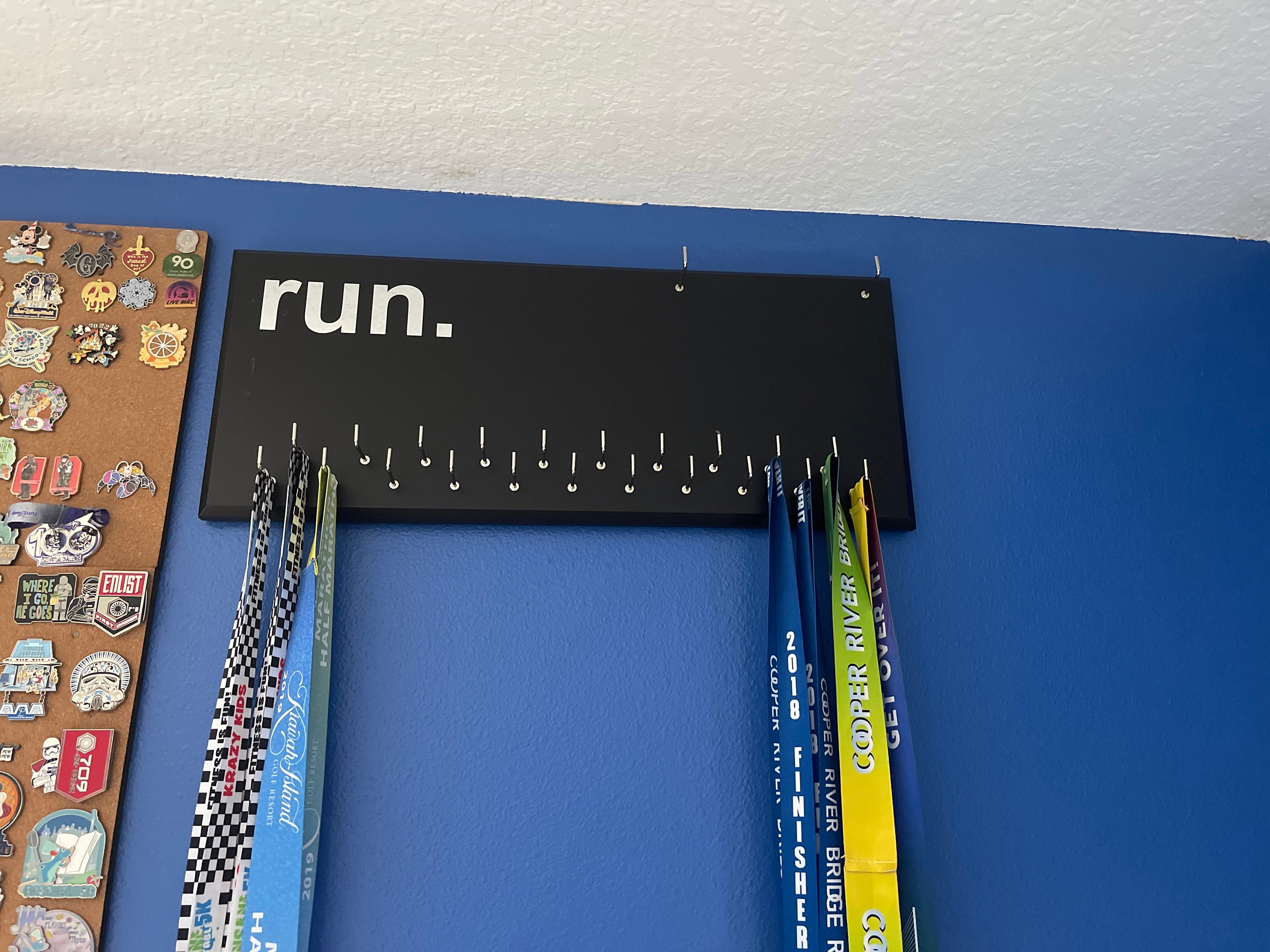 Running Medal Holder, gray or black with chrome "run." vinyl, 21 hooks and BIB holder