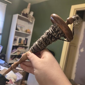 Sasha added a photo of their purchase