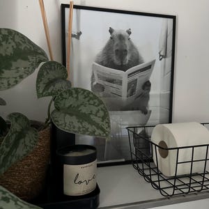 Nicola added a photo of their purchase