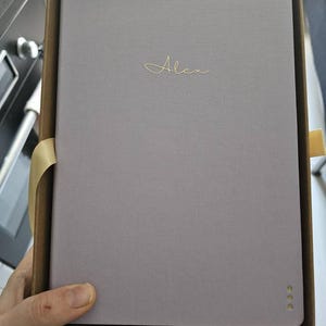 Alexandra added a photo of their purchase