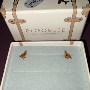 Customer photo, T-Rex Fossil Stud Earrings