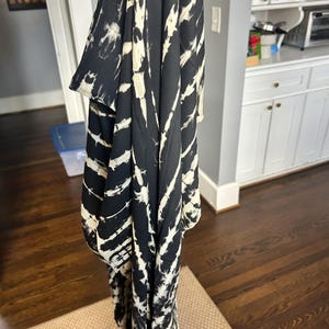 Gina added a photo of their purchase