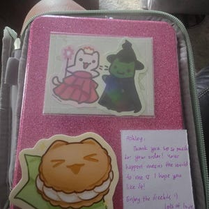 Ashley added a photo of their purchase