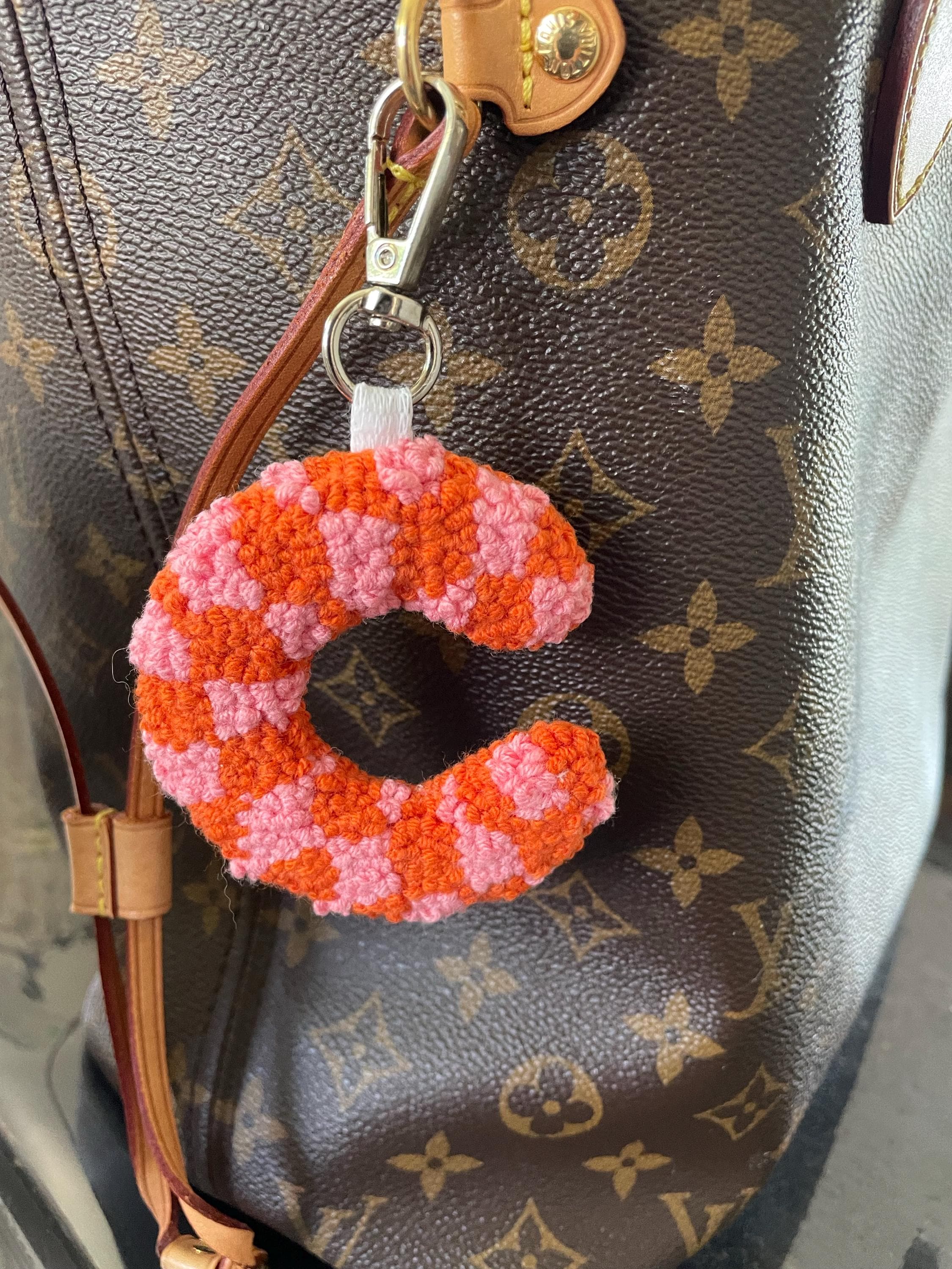 It is a cute bag charm, but the design is only on one side maybe that was in ...