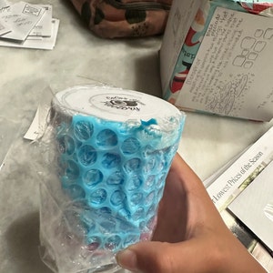 Rebecca added a photo of their purchase