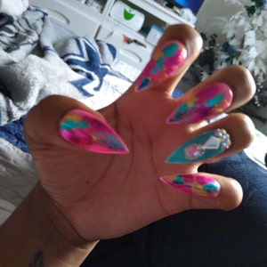 Danielle Pace added a photo of their purchase