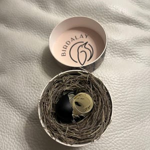 Sasha added a photo of their purchase