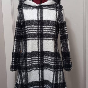 Susie added a photo of their purchase