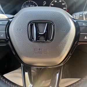 Douglas added a photo of their purchase