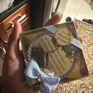 Aya added a photo of their purchase