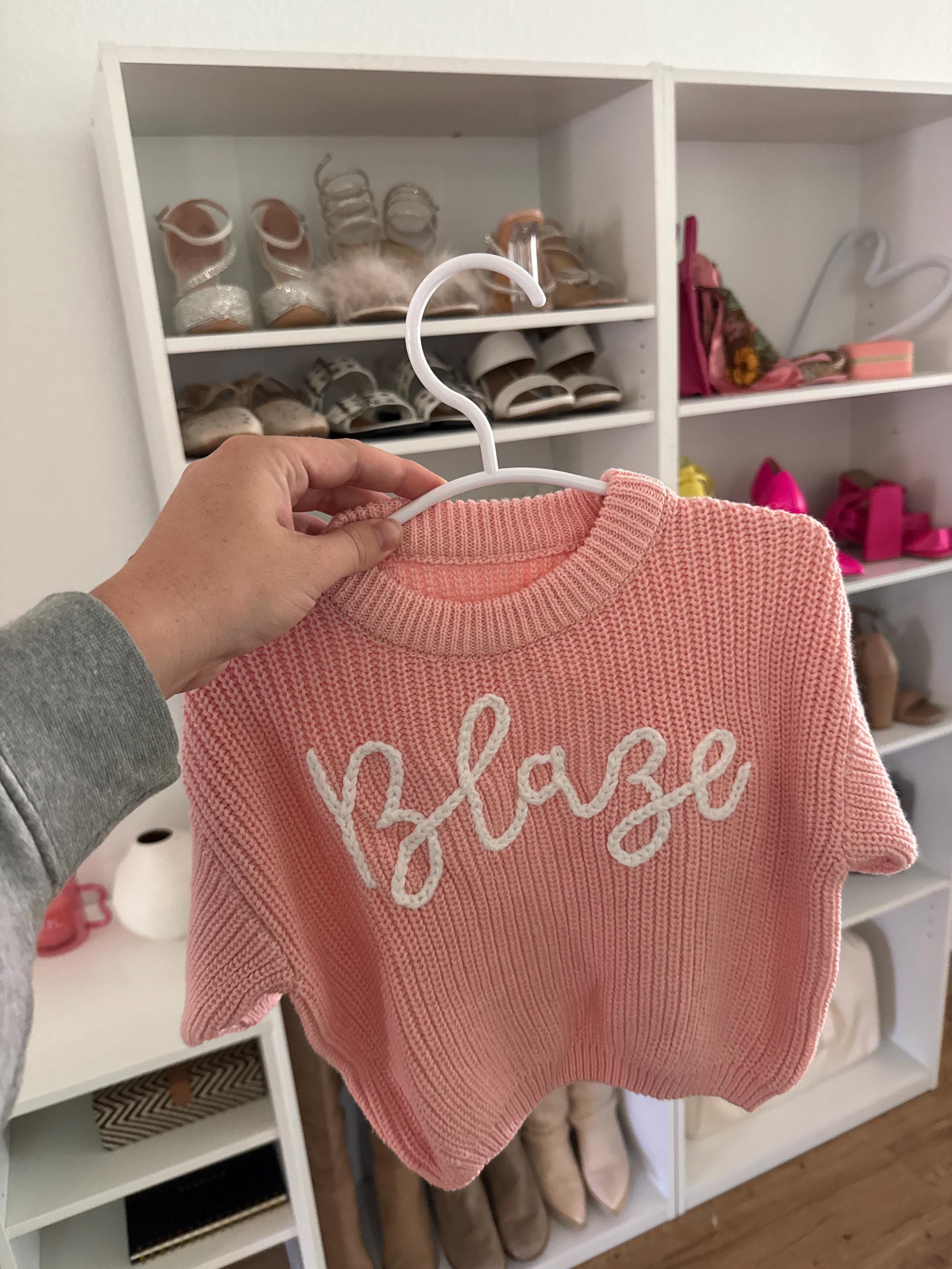 Cherished Custom Baby Sweaters: Personalize Their Name with Exquisite Embroidery