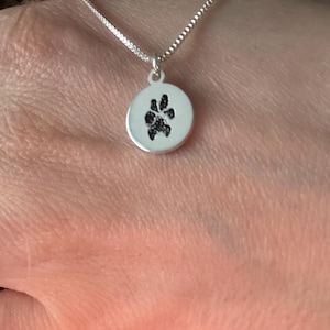 Emma added a photo of their purchase