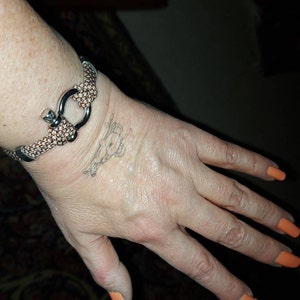 Chrissy added a photo of their purchase