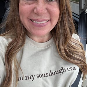 Sarah added a photo of their purchase