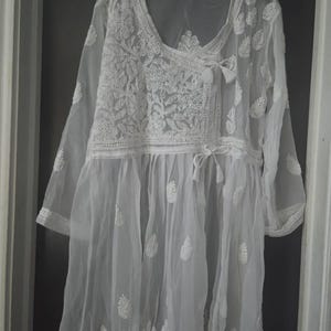 Sharron added a photo of their purchase