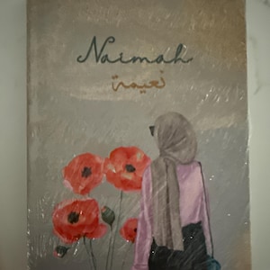 Fatimah added a photo of their purchase