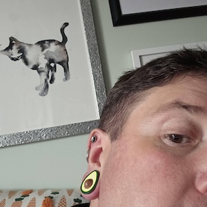 Christopher added a photo of their purchase