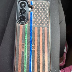 Samantha added a photo of their purchase