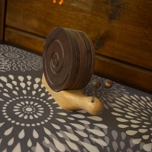 Sottobicchieri di lumache in legno Simpatici tovagliette
