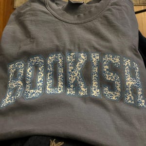Ashley added a photo of their purchase