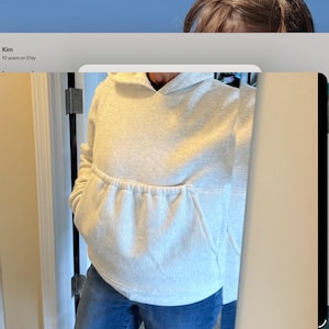 Kim added a photo of their purchase