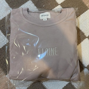 Mayra added a photo of their purchase