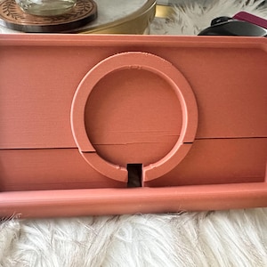 Aisha added a photo of their purchase