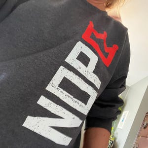 Pam added a photo of their purchase