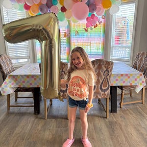 Sarah added a photo of their purchase