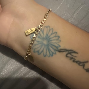 Anahí added a photo of their purchase