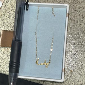 Customer photo, Cursive Name Necklace