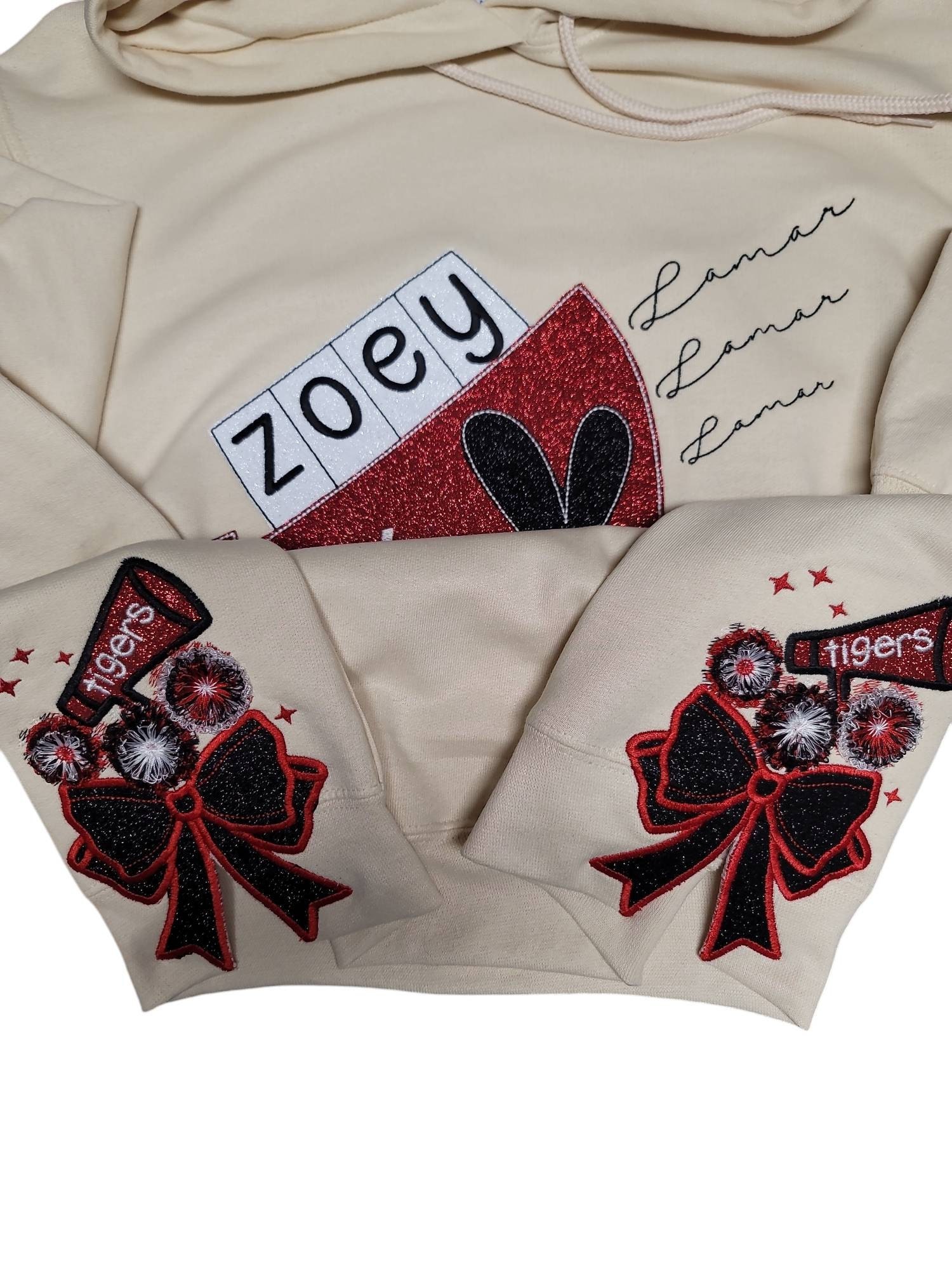 Customer project using Cheerleader Fringed Pom Poms Bow embroidery design