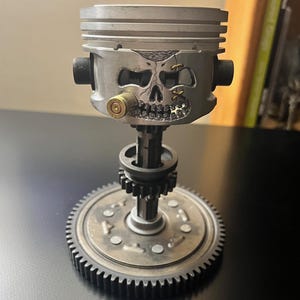 ピストンスカルフェイス彫刻、メタルアートフィギュア、ハンドメイド