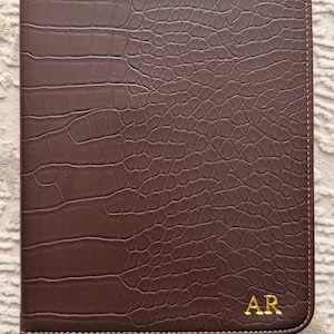 Aigul added a photo of their purchase