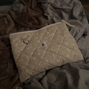 Sarah added a photo of their purchase