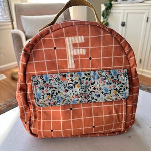 Sarah added a photo of their purchase