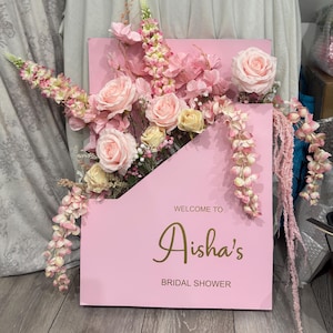 Aisha added a photo of their purchase