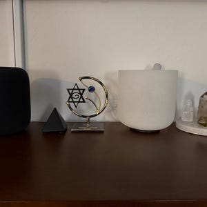 Sharon added a photo of their purchase