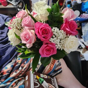 Sheryl added a photo of their purchase