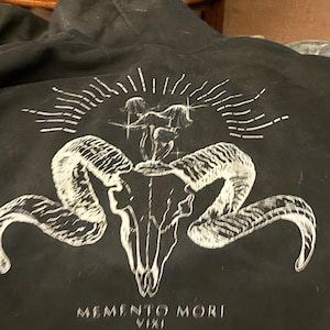 Sarah added a photo of their purchase