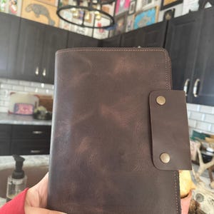 Nina added a photo of their purchase