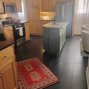 Gina added a photo of their purchase