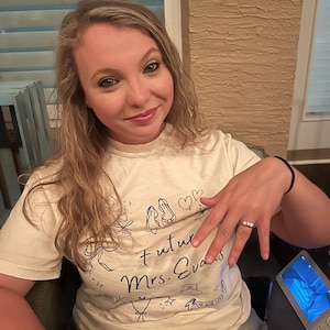 Gina added a photo of their purchase