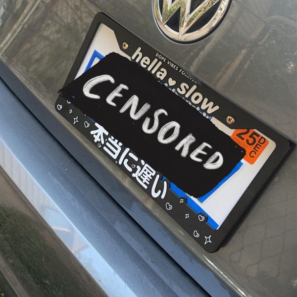 Turtle HELLA SLOW JDM License Plate Frame – Comical Black Plastic – BLVD 1378