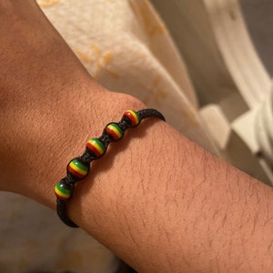 Bandeau bracelet eponge pour poignet vert jaune noir Jamaica