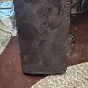 Luis added a photo of their purchase