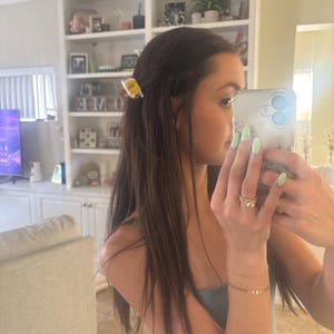 Samantha added a photo of their purchase