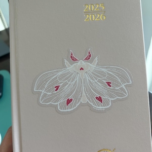 Cristina added a photo of their purchase